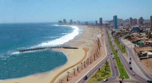 an aerial view of a beach and the ocean at Departamento nuevo con hermosa vista a playa brava in Iquique