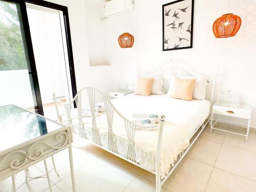 Ένα ή περισσότερα κρεβάτια σε δωμάτιο στο Residence Jannet 2 Luxury Seaside 3 bedrooms