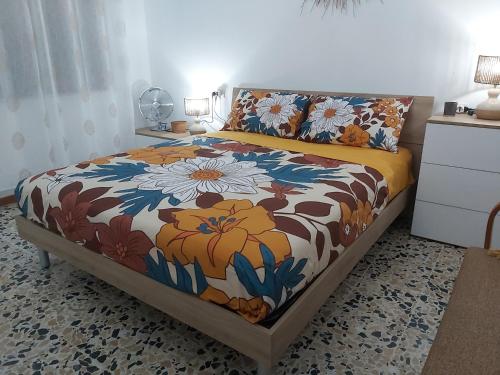 Een bed of bedden in een kamer bij Hortensia Home