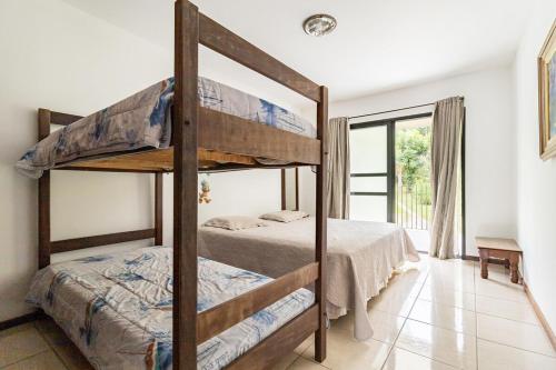 Postel nebo postele na pokoji v ubytování Chácara Privativa com Quadra de Beach Tennis