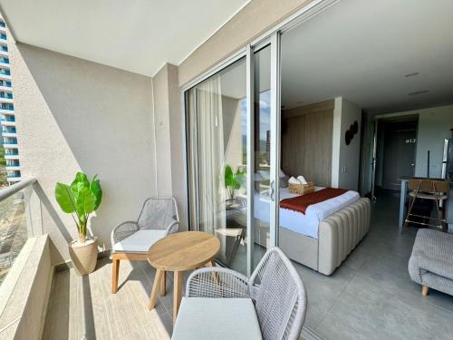 Una cama o camas en una habitación de Apartamento cerca al mar santa Marta- santamarina-614