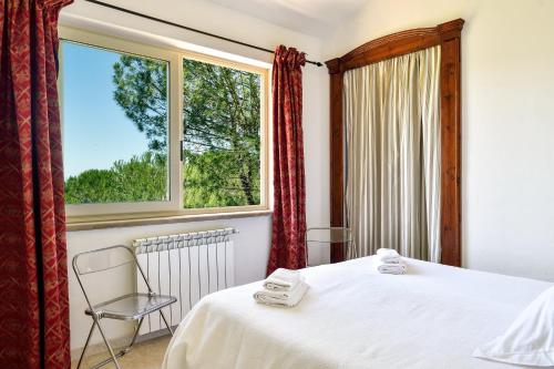 Giường trong phòng chung tại Villa Paradiso