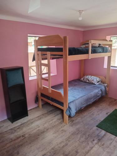 Ένα ή περισσότερα κρεβάτια σε δωμάτιο στο Small House Pisac