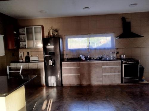 Kuchyň nebo kuchyňský kout v ubytování Flor silvestre