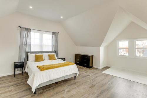 a white bedroom with a bed and a window at 10 Mi to Lincoln Financial Field Family Home! in Colonial Manor