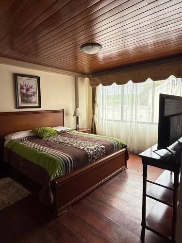 Llit o llits en una habitació de House Loft Loja
