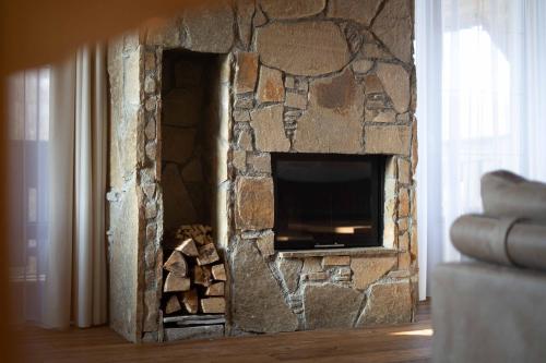 Μια τηλεόραση ή/και κέντρο ψυχαγωγίας στο Prezidentský Apartmán v Rezidencii Hotela Kukučka