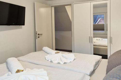 Ένα ή περισσότερα κρεβάτια σε δωμάτιο στο Pension Likedeeler