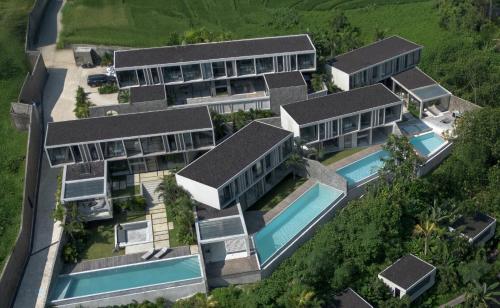 Bazén v ubytování Predmet Kabakaba Resort Tabanan Bali nebo v jeho okolí