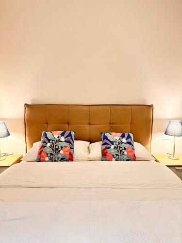 Ένα ή περισσότερα κρεβάτια σε δωμάτιο στο La Corte di Angelico