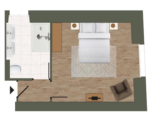a floor plan of a bathroom with a toilet at Logis Vélès in Aubin