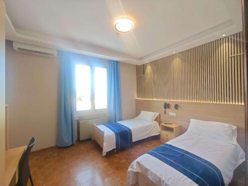 Postel nebo postele na pokoji v ubytování Hotel Ristorante Oro