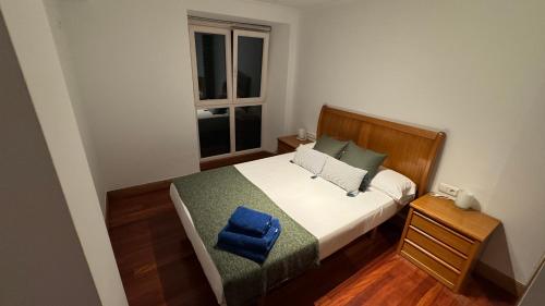 Ένα ή περισσότερα κρεβάτια σε δωμάτιο στο SANTA KATALINA MUNDAKA by Urdaibai Experience