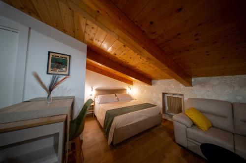 Ένα ή περισσότερα κρεβάτια σε δωμάτιο στο SALERNUM Luxury Apartments