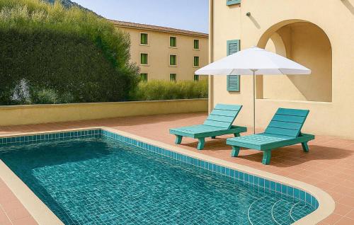 Bazén v ubytování Cozy Home In Algajola With Kitchen nebo v jeho okolí