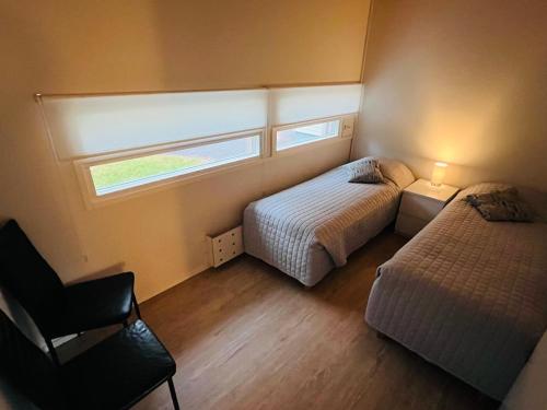 Postel nebo postele na pokoji v ubytování The Zen Den Rokua