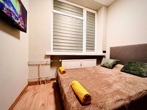 Postel nebo postele na pokoji v ubytování M&M Apartment IV SELF CHECK-IN