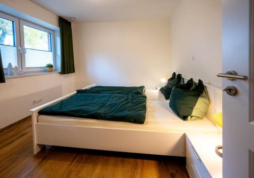 Ένα ή περισσότερα κρεβάτια σε δωμάτιο στο Dachsbau