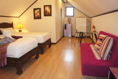 Кровать или кровати в номере Phuket Gay Homestay