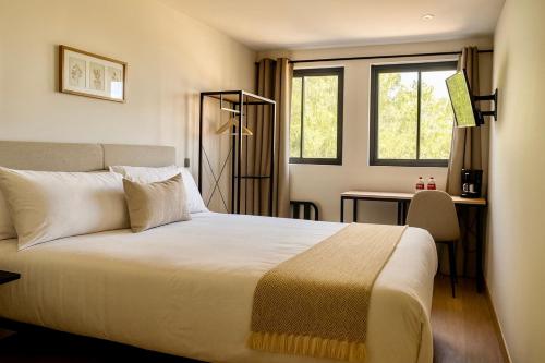 Postel nebo postele na pokoji v ubytování Casa Marina