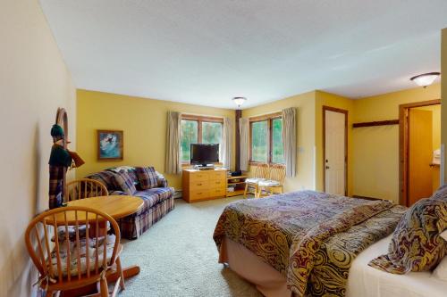 Ένα ή περισσότερα κρεβάτια σε δωμάτιο στο Kettle Brook A6