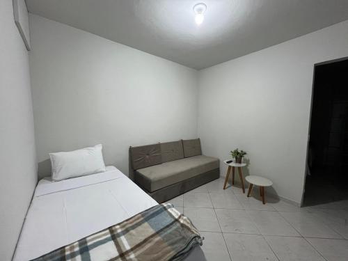 Postel nebo postele na pokoji v ubytování Recanto Canuto D