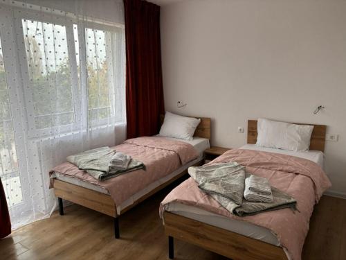 Postel nebo postele na pokoji v ubytování TESLA 132 Apartment 9