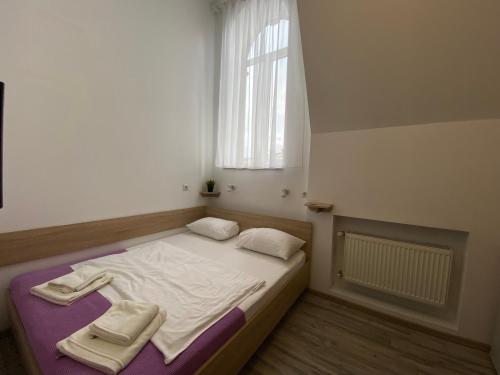 Ένα ή περισσότερα κρεβάτια σε δωμάτιο στο Hamster 007 Secret Hotel