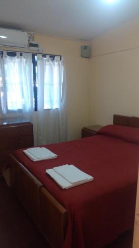 Postel nebo postele na pokoji v ubytování Departamento San Rafael