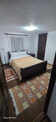 Postel nebo postele na pokoji v ubytování Casa LEO