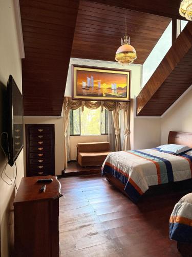 Postel nebo postele na pokoji v ubytování House Loft Loja