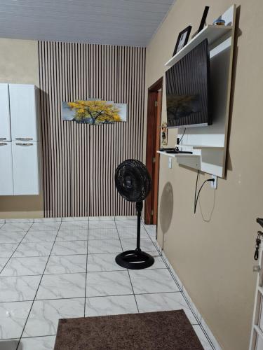 TV a/nebo společenská místnost v ubytování KL Residencial