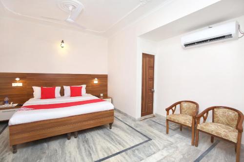 Postel nebo postele na pokoji v ubytování Hotel O The Nest