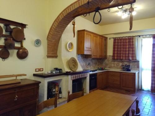 A kitchen or kitchenette at Residenza Zona Franca