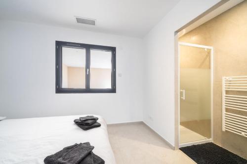 Koupelna v ubytování Maison détente Ambiance cosy près d'Arles Nîmes