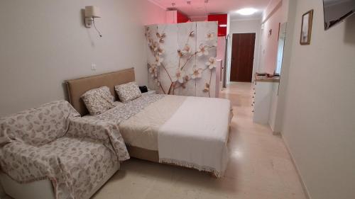 En eller flere senge i et værelse på Modern Studio by the sea