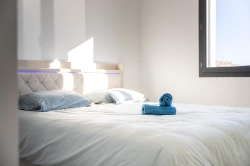 Postel nebo postele na pokoji v ubytování Villa spacieuse ambiance cosy près d'Arles Nîmes Avignon - jusqu'à 12 personnes