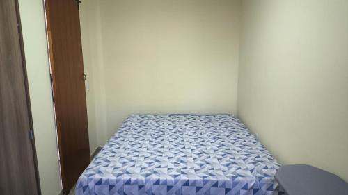 Ένα ή περισσότερα κρεβάτια σε δωμάτιο στο Casa tranquila no Santinho