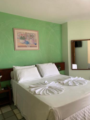 Giường trong phòng chung tại Hotel Terra Mater
