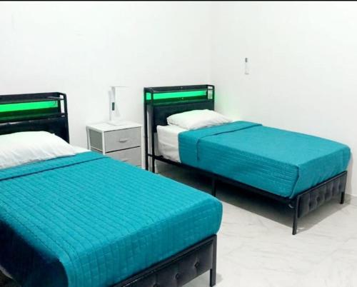 Postel nebo postele na pokoji v ubytování bienvenidos a viko's house