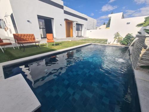 Bazén v ubytování Villa avec piscine nebo v jeho okolí