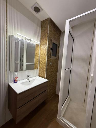 Et badeværelse på 3-bedroom apartment