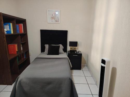 Ένα ή περισσότερα κρεβάτια σε δωμάτιο στο Casa Luna