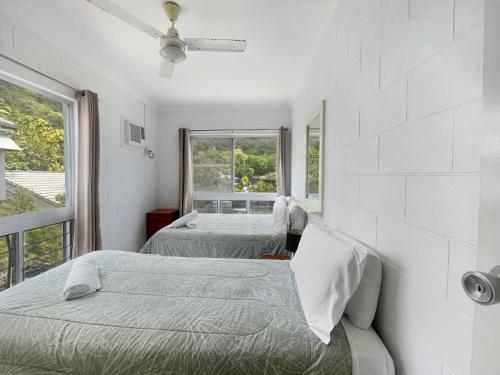 a bedroom with two beds and a window at Arcadia Beach Unit 4 in Arcadia