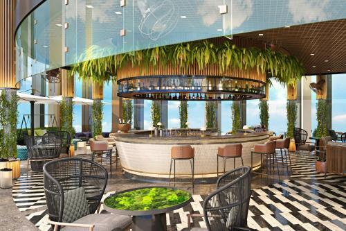 a rendering of a hotel lobby with a bar at Sheraton Kota Kinabalu in Kota Kinabalu
