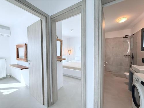 a bathroom with a shower and a sink at Villa Finoe 4 BDR with Private Pool in Plaka
