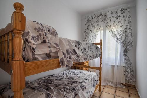 Postel nebo postele na pokoji v ubytování Cal Sopas