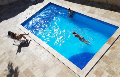 Piscina en o cerca de Follow the Sun Boutique Hostel - Pool, Breakfast & Sea Views