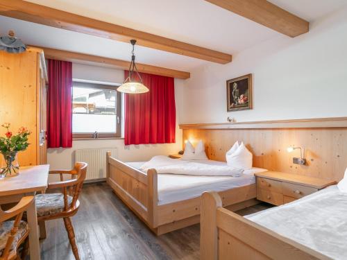 Ένα ή περισσότερα κρεβάτια σε δωμάτιο στο Landhaus Marchfeld Top 4