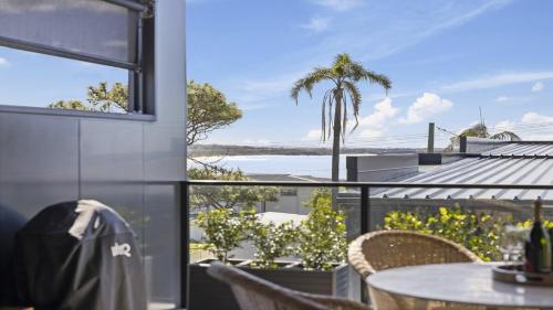 Φωτογραφία από το άλμπουμ του Echoes - Luxury Home Beach Views Walk to Cafes σε Woolgoolga